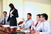 Employees at a conference table