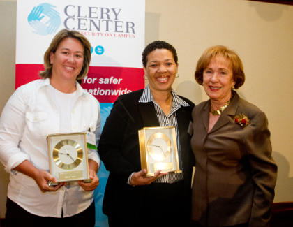 Allison Jacobs (left) and Lisa Campbell (center) accept their awards from Connie Clery