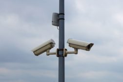 surveillance cameras attached to pole