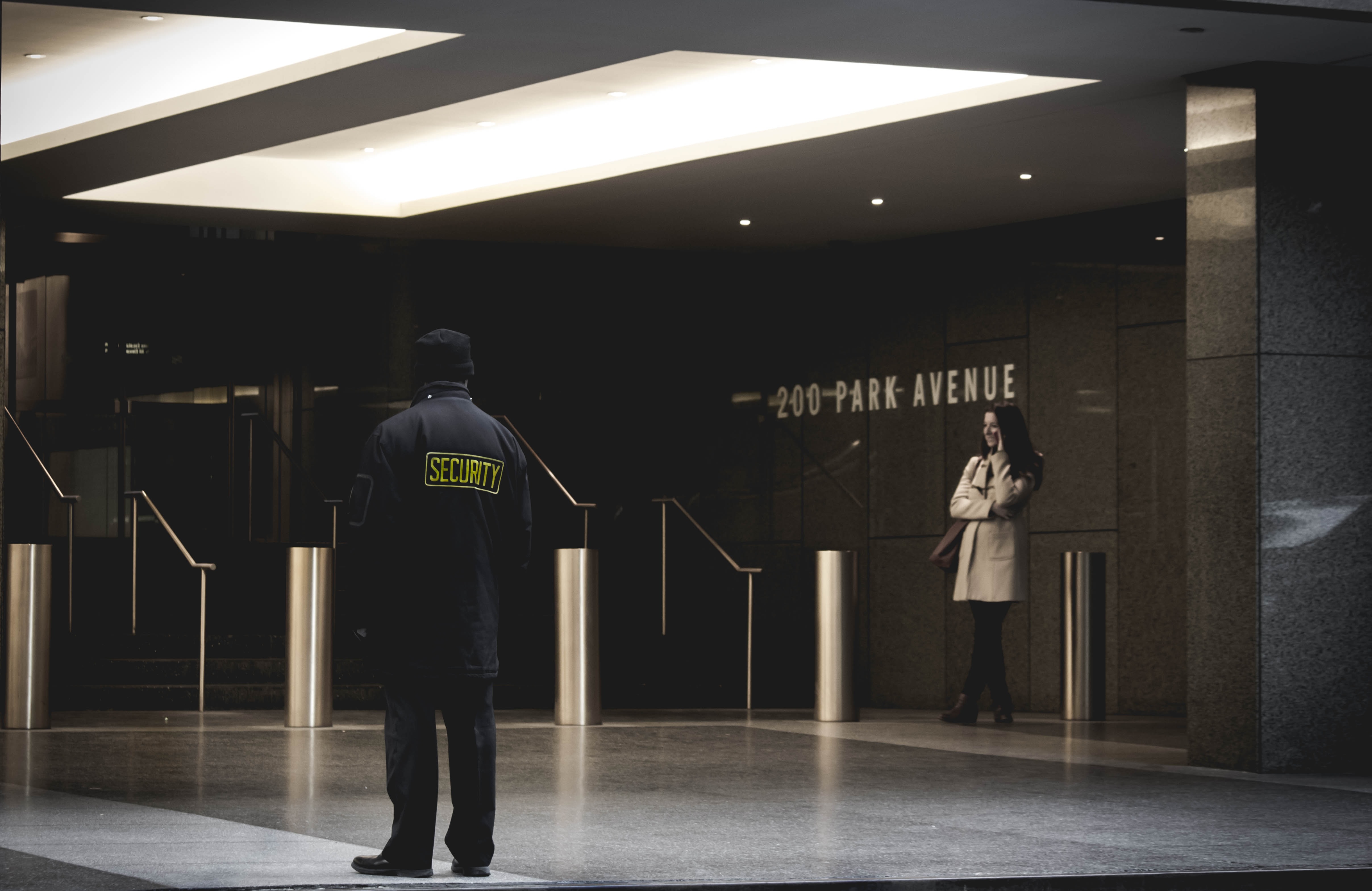 Security guard in building lobby