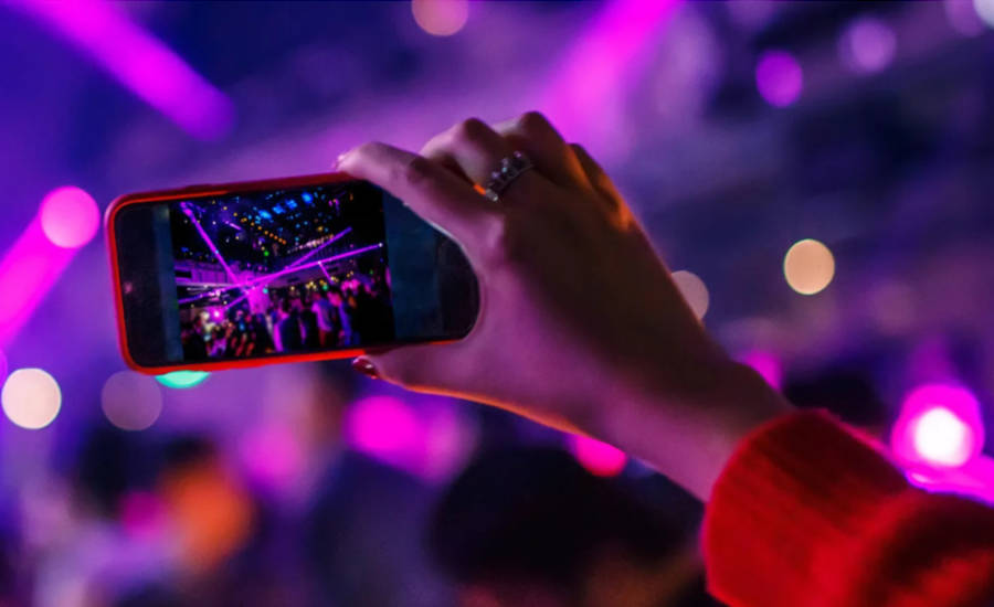 Hand Holding Phone at Concert