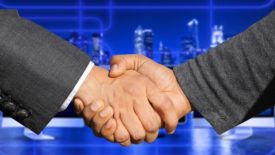 Business people shake hands