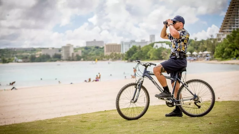 Guam visitor safety officer on beach
