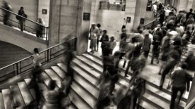 Busy stairwell with a crowd