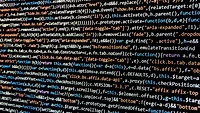 multicolored html text on black screen