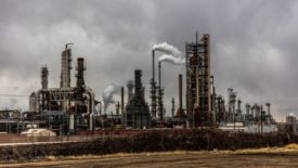 oil refinery and gray clouds