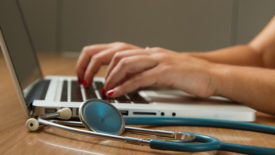Healthcare-worker-laptop-unsplash