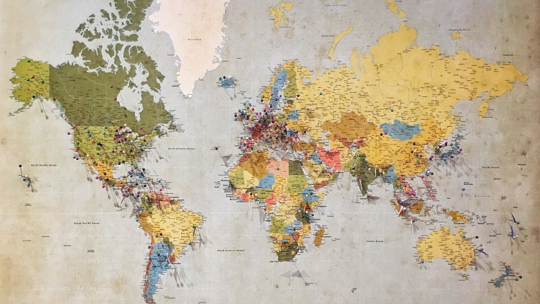 world map with pins in place