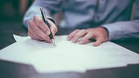 man-signing-document.jpg