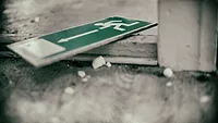 Fallen down exit sign