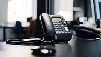 work phone on desk work phone on desk