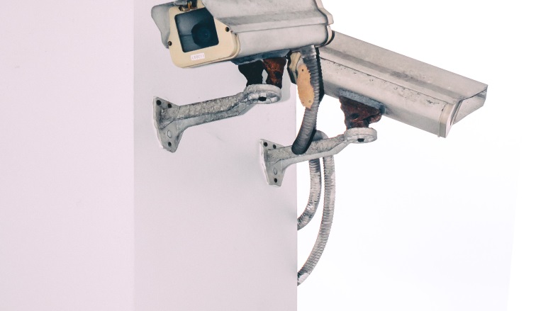 surveillance cameras on wall