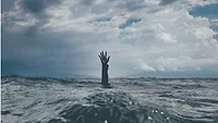 employee burnout hand reaching out of water