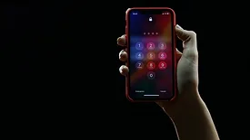 phone open to colorful lock screen
