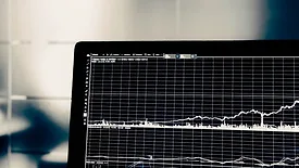 black screen showing white chart