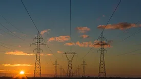 power lines going over grass