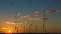 power lines going over grass