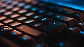 black keyboard with blue lights