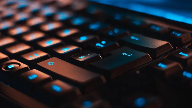 black keyboard with blue lights