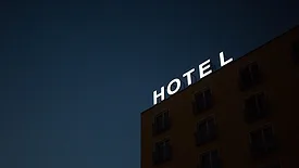dark building with white hotel sign