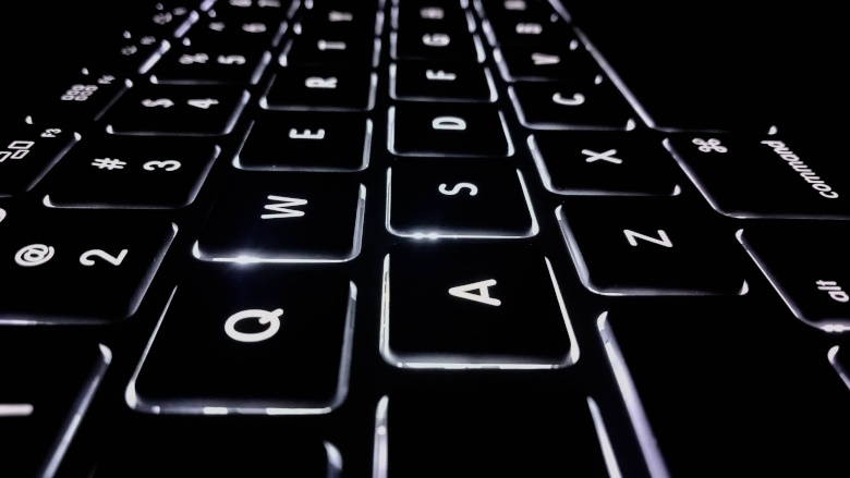 black keyboard with white lighting