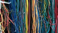 Colorful wires twisted together Colorful wires twisted together