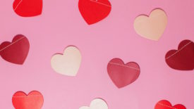 colorful hearts on pink background