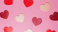 colorful hearts on pink background