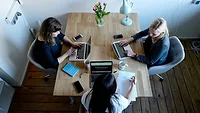 People working around table People working around table