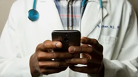 Doctor using phone