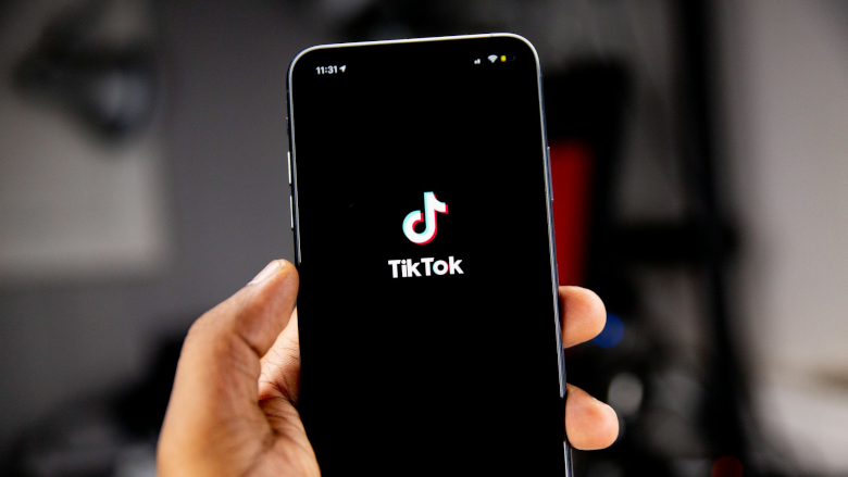 Phone displaying TikTok app logo