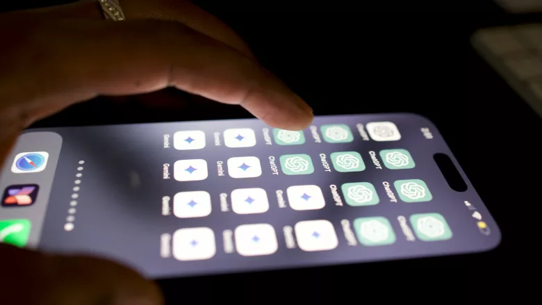 Person tapping AI app on phone