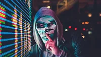 Person in skull mask Person in skull mask