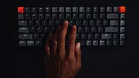 Hand on keyboard Hand on keyboard