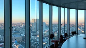 Curved office wall of floor to ceiling windows