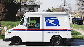 White post office truck