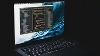 Open laptop in dark room