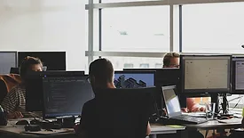 People working together at shared desk