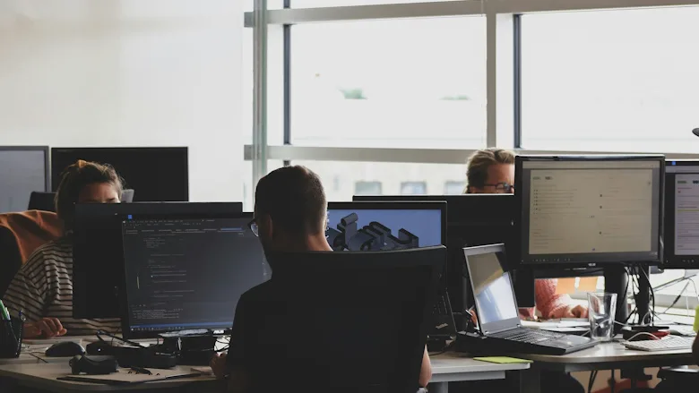 People working together at shared desk