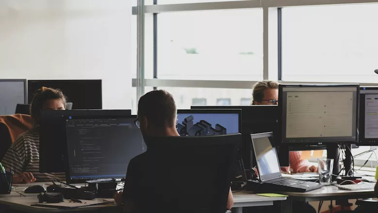 People working together at shared desk