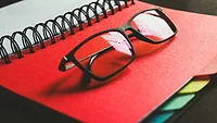Glasses on planner Glasses on planner