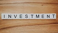 Investment spelled with blocks Investment spelled with blocks