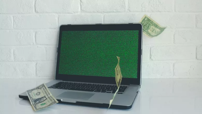 Laptop with money