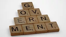 Scrabble tiles spelling out 'Government'