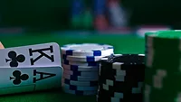 Cards and chips on table Cards and chips on table