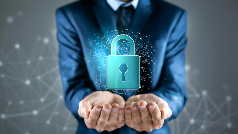 Man holding digital padlock