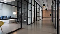 Office hallway with glass walls Office hallway with glass walls