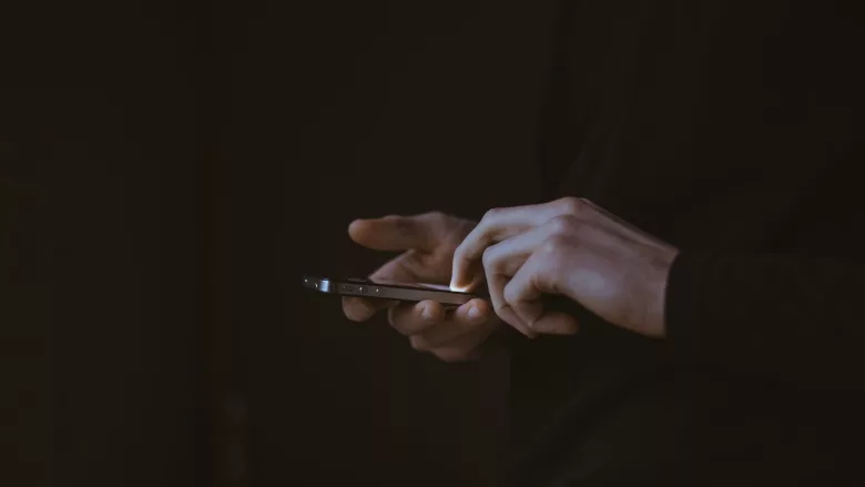 Person holding phone 