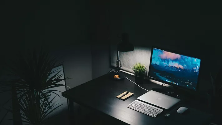 Computer in darkness 