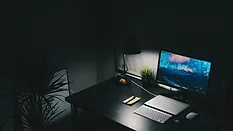 Computer in darkness 